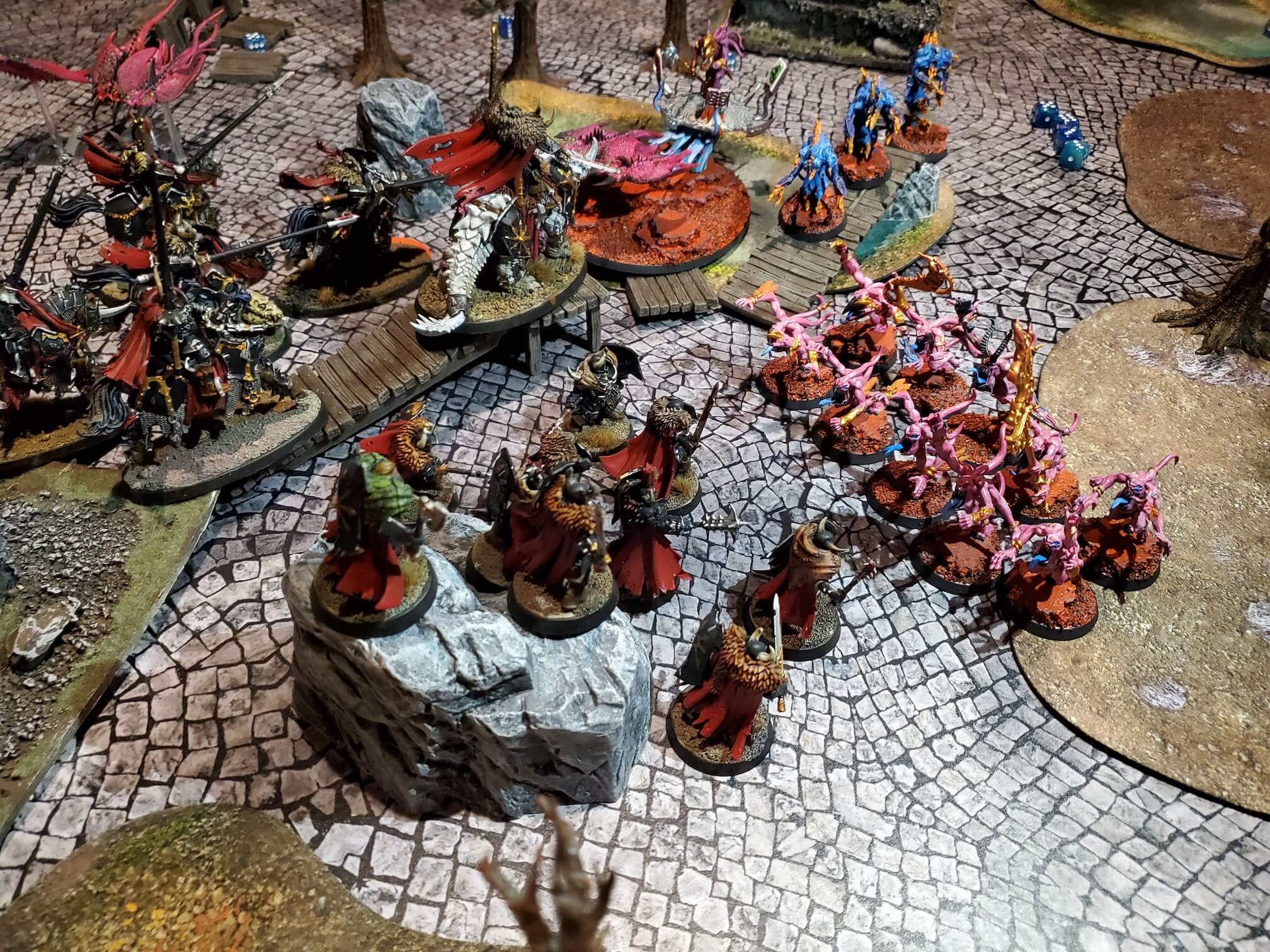 Miniatures fighting on a large battlefield